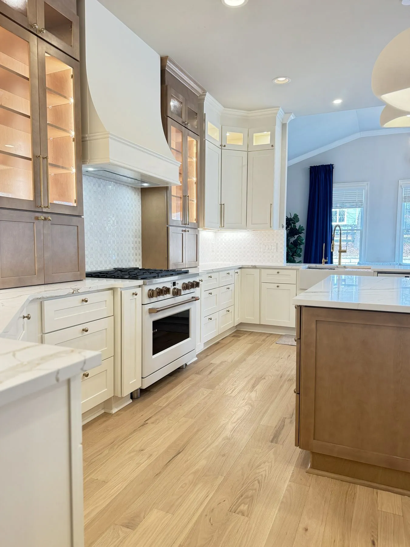 Range wall with the custom paneled hood
