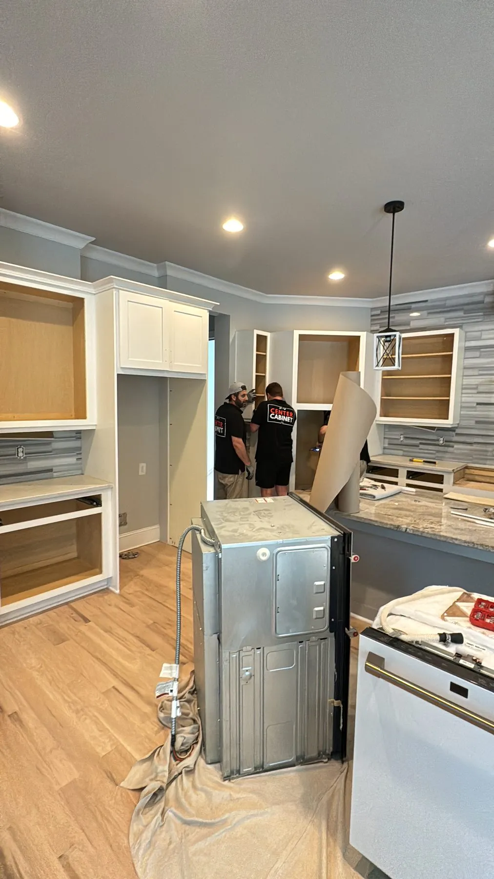 Tear-out day — doors off, old counters coming out